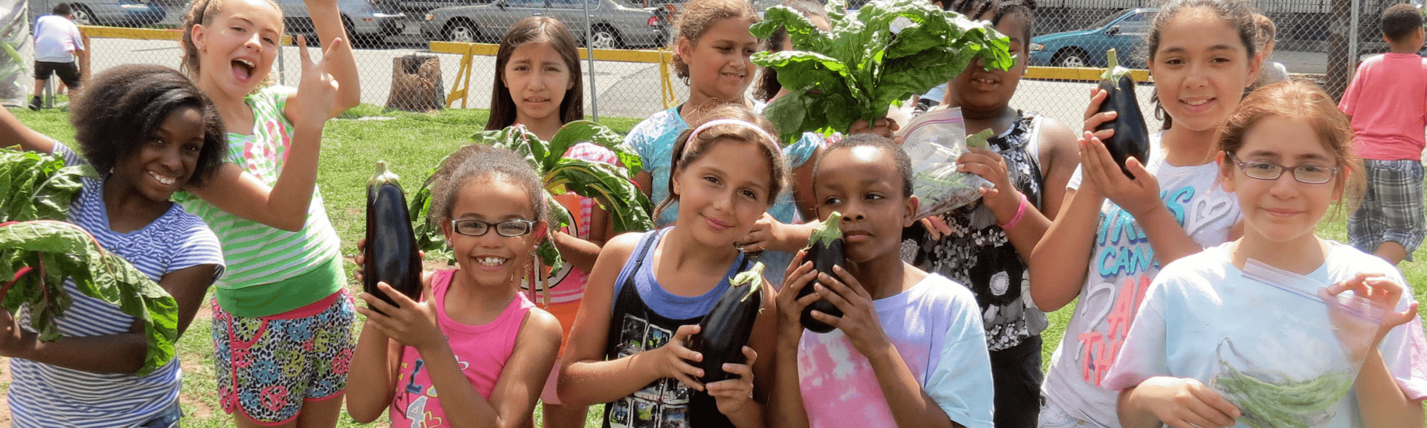 children in harden with veggies