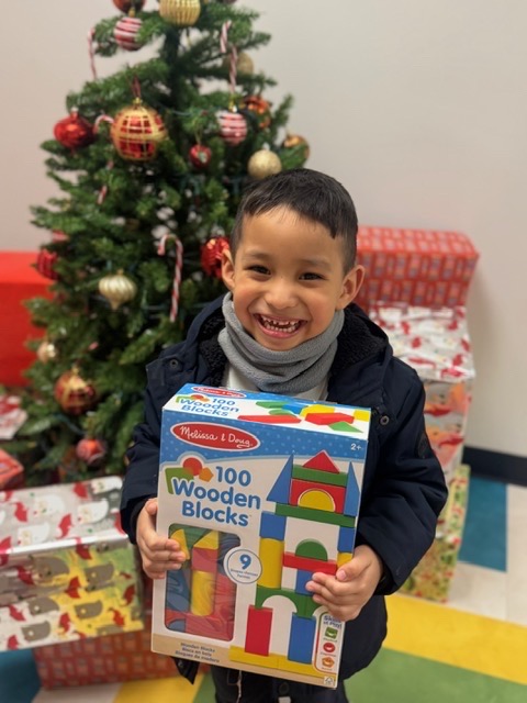 boy holding a present